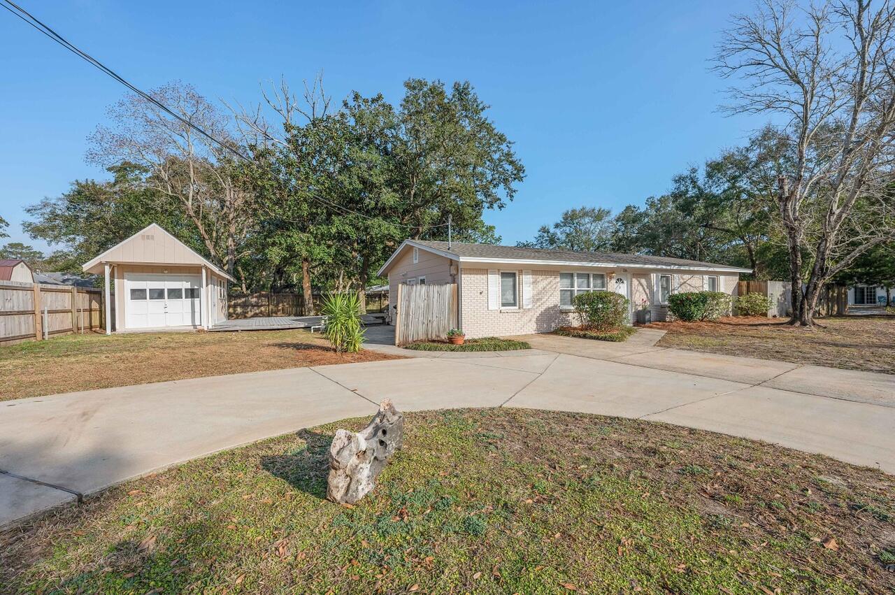 Welcome to this beautifully maintained 3-bedroom, 2-bath all-brick home offering nearly 1,500 square feet of living space on a spacious 0.22-acre lot. This property features a detached garage and a fenced backyard perfect for relaxing or entertaining. Inside you'll find a bright and inviting living area, a functional kitchen with ample cabinet space, and a dining area ready for gatherings. The primary bedroom includes an en suite bath, while two additional bedrooms offer versatility for guests, family, or office needs.Updates include a new shutters 2023, new hot water heater 2024, and new insulation 2025. The all-brick construction offers timeless curb appeal and durability.Schedule a showing!