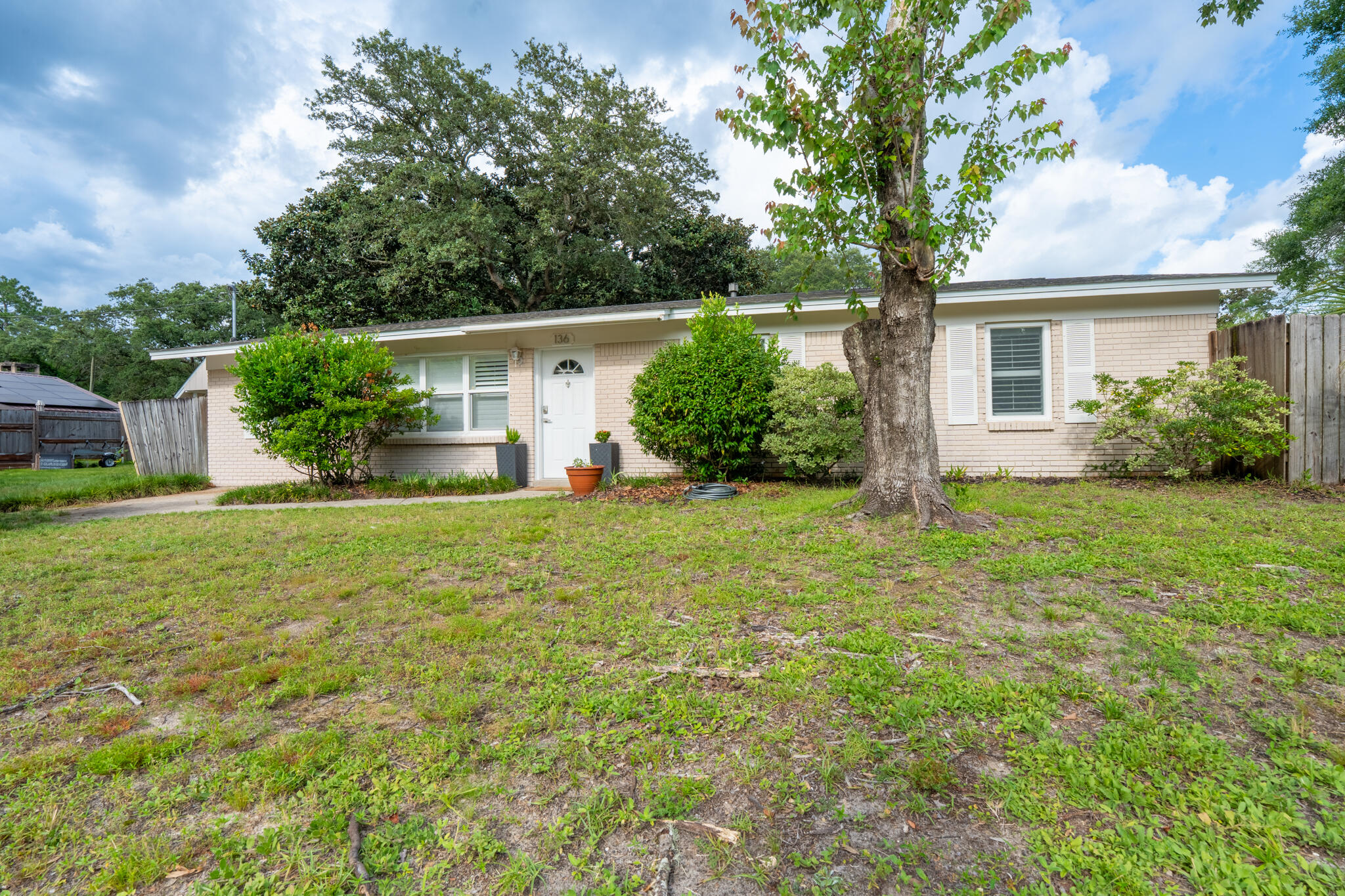 Welcome to this beautifully maintained 3-bedroom, 2-bath all-brick home offering nearly 1,500 square feet of living space on a spacious 0.22-acre lot. This property features a detached garage and a fenced backyard perfect for relaxing or entertaining. Inside you'll find a bright and inviting living area, a functional kitchen with ample cabinet space, and a dining area ready for gatherings. The primary bedroom includes an en suite bath, while two additional bedrooms offer versatility for guests, family, or office needs.Updates include a new shutters 2023, new hot water heater 2024, and new insulation 2025. The all-brick construction offers timeless curb appeal and durability.Schedule a showing!