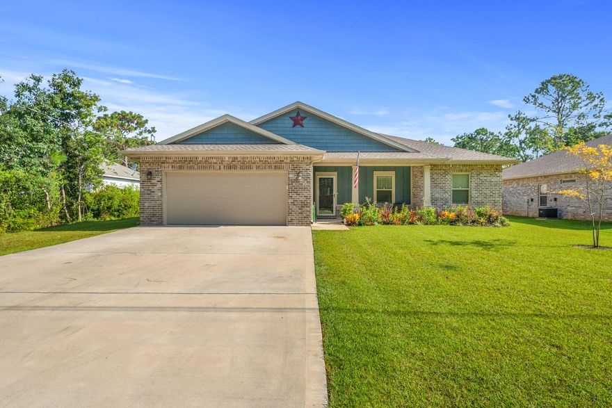 Multiple offers Highest & best 5pm Tuesday .Exceptional  home located in a prime east Navarre location with many upgrades throughout. Clad with the timeless durability of brick, cement fiber board accents, and an architectural shingled roof. Sprinkler system and fenced backyard comes standard! Interior offers thick wood laminate flooring in the common areas, visually pleasing neutral tile in the baths and laundry room, and carpet in the bedrooms. Custom paint color is accented with a wide baseboard, beautiful crown molding, and spectacular tray ceiling accents in the master bedroom, dining and entry area. Transom windows over the hall entryways provide a high end custom touch. Stainless steel appliances including refrigerator, stunning shaker style cabinets, and granite.