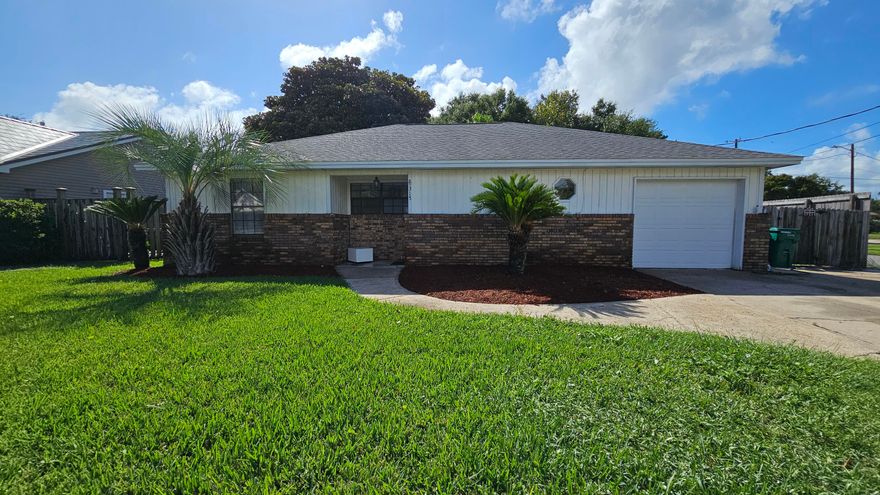 Stunning 4 Bedroom, 3 Bathroom Home in the Heart of Destin!This beautiful home offers a perfect blend of comfort and style with an inviting open floor plan. Step into the living room, where you'll find gorgeous hardwood flooring, a cozy fireplace, and soaring cathedral ceilings. The kitchen is a chef's dream, featuring a breakfast bar, granite countertops, tile backsplash, recessed lighting, stainless steel appliances, and plenty of counter space for meal prep and entertaining.The spacious master bedroom includes a charming reading nook, LVP flooring, walk in closet. The master bathroom boasts double sinks and tub/shower combo. Outside, the private backyard is ideal for entertaining with a refreshing in-ground pool, and covered patio. Additional features a one-car garage.