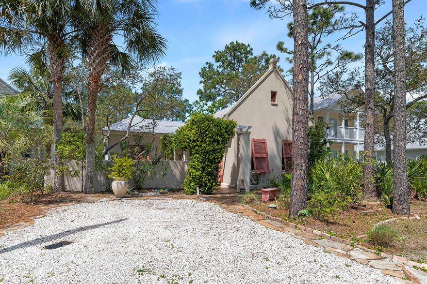 Custom built concrete home just a short stroll to the beach in Seagrove. Welcome to 181 San Juan, a meticulously maintained home that has never been rented by the current owner. Enjoy single level living with an open floor plan kitchen/dining/living room, perfect for entertaining. Vaulted ceilings in this area along with the master bedroom add architectural beauty. An abundance of built in shelving compliment the gas fireplace, perfect for cooler winter nights. For those hot summer days, the backyard is a private oasis with potential room to add a swimming pool. The front yard has a beautiful courtyard area that is designed for both relaxation and gardening. Updates include but are not limited to 2022 new AC, updated dishwasher, washer, dryer, toilets, countertops, gas cooktop, wood flooring, carpet in bedroom and shed with generator. This home is a direct stroll south, approx 0.2 miles to the S San Juan beach access. Although the home has been used as a primary residence, it would make a fabulous investment property or second home. Gulf Shore Manor offers convenient Seagrove living with no HOA fees and a voluntary POA.