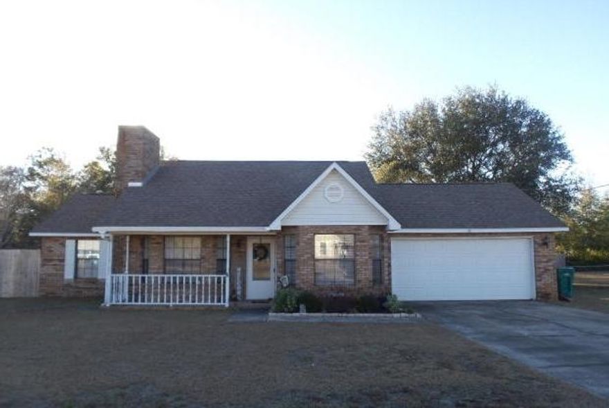 Great South Crestview home on large lot. 3/2 floor plan with beautiful tile wood floors. Custom paint, dining area, wood burning fireplace, many upgrades. Large covered back porch area, HUGE back yard and pet friendly. This is a must see. Oversized driveway and no HOA. No inside smoking. Lawn care INCLUDED in rental rate. Worry free yard. 2 car garage and easy commute to bases and beaches. Pets will be allowed with a $400 non-refundable pet fee.