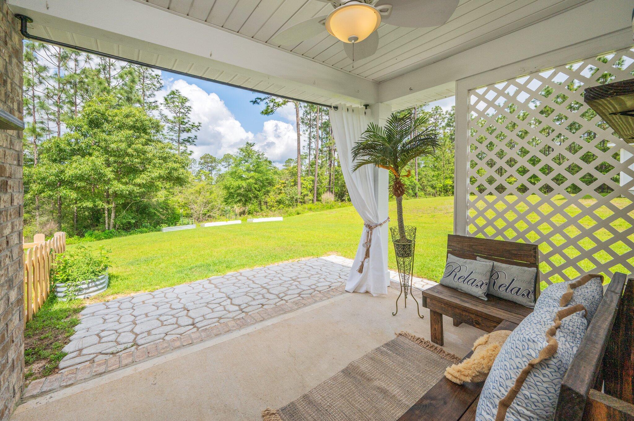***Seller now offering a 2/1 interest rate buydown and will pay buyer's closing costs--making this home an even smarter buy! Plus, other buyer incentives available. Ask your agent for details!***This better-than-new 2022 ALL BRICK home is move-in ready and packed with extras you simply won't find next door. While identical floorplans are pushing $370,000+ in other neighborhoods, this beauty delivers unbeatable value with over $20,000 in seller upgrades already in place -- saving you time, money, and hassle. This is the smart buyer's choice!
Upgrades that Shine: Stainless steel fridge with water/ice dispenser included * Washer & dryer included * Tiled kitchen backsplash * Upgraded lighting fixtures and stylish vanity mirrors * Sleek Glass Shower Door in Primary Bath * Wainscoting detail in secondary bedroom * Beadboard detail in living room * ADT security system * Upscale drapery, rods, and faux wood blinds throughout * Abundant recessed lighting, even in the garage! * Ceiling fans in bedrooms & patio * Brand new carpet in all bedrooms * Beautiful landscaping & curb appeal.
Heritage Plantation offers peaceful living, scenic streetscapes, sidewalks. community pool and an impressive stone-paved entrance, all just six miles to Publix and quick access to local conveniences, offering the serenity buyers crave without sacrificing accessibility. Move into this beautiful home with all the extras already done for you and pocket the savings! Expertly staged to highlight the home's best features and move-in ready appeal.