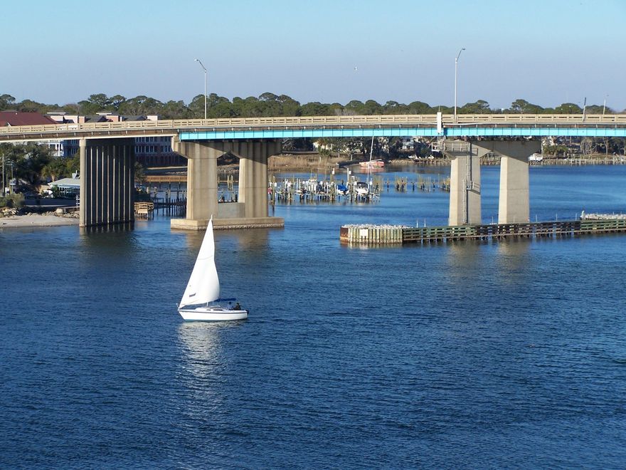 The Best of Both Worlds! Boating and the Beach! Directly on the Sound, this unit has front row seats for all the activity on the water, including the Billy Bowlegs Festival, and all the steady water traffic from across the country. A private gate to the boardwalk gives easy beach access. In addition, Palm Court Yacht Club is a gated community with great amenities including a heated pool, hot tub, grilling area, lockers, docks, boat slips, and covered parking. The owner has been diligent in the upkeep and it shows. A new water heater and air conditioner are just 2 examples. Come view this beautiful property!