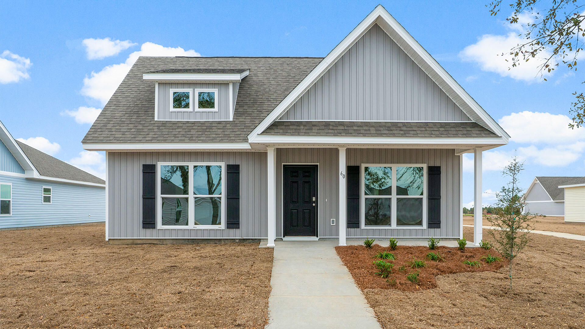 The Owl's Head community is conveniently located off of Highway 331 in Freeport. We are only 8 miles to Interstate 10, and 16 miles to beautiful beaches and Highway 30 A. We offer 6 floor plans, 3 and 4 bedrooms. All homes have rear entry garages. This community offers a community area with paved walking trails and a spring fed lake. | The Bayberry plan is a single story 3 bedroom, 2 bath home. This open floor plan features a covered front porch and a very large primary bedroom. The primary bathroom has a large shower, and a spacious closet off of the bathroom.