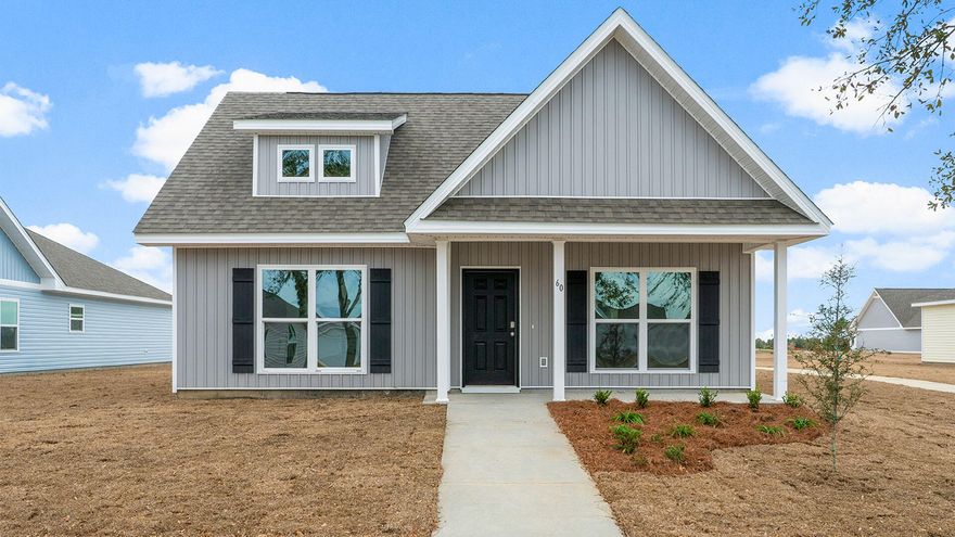 The Owl's Head community is conveniently located off of Highway 331 in Freeport.  We are only 8 miles to Interstate 10, and 16 miles to beautiful beaches and Highway 30 A.  We offer 6 floor plans, 3 and 4 bedrooms.  All homes have rear entry garages.  This community offers a community area with paved walking trails and a spring fed lake. | The Bayberry plan is a single story 3 bedroom, 2 bath home.  This open floor plan features a covered front porch and a very large primary bedroom. The primary bathroom has a large shower, and a  spacious closet off of the bathroom.