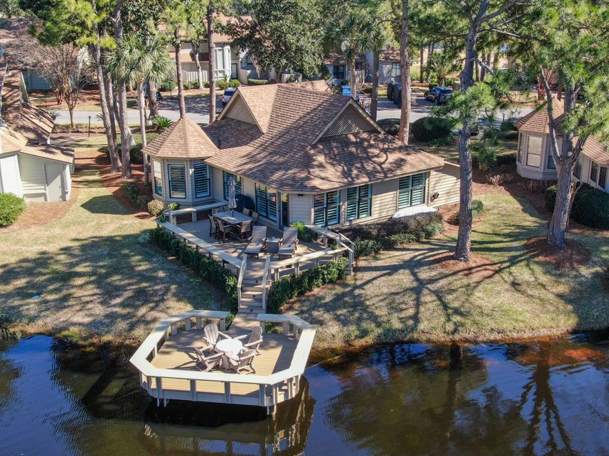 ARE THOSE DIAMONDS IN THE POND? Be careful, the waterview can be somewhat mesmerizing and the appearance of sparkling objects may draw your gaze for long periods of time. And, this detached home comes with optimal means of enjoying the view: an oversize patio and a dock! The dock is a perfect place to fish or enjoy the firepit, and the patio is equipped with a durable POLYWOOD DINING SET and 2 LOUNGE CHAIRS.  Adding to the experience are MARTIN LOGAN outdoor speakers that fill the air with high-end acoustic sound. Although built in 1982, the sensation of stepping into a new home will be perceived at the driveway.  The complete updating/renovation process began 4 years ago when the owner replaced the flooring and enclosed the back patio. However, once the current owners purchased