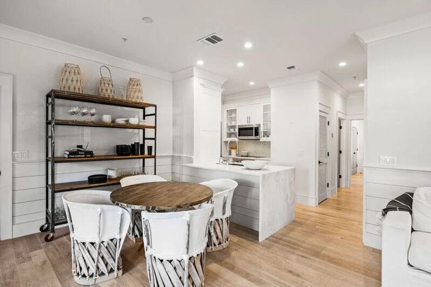 Welcome to Rosemary Beach, where luxury meets coastal living. This stunning 2-bedroom, 2-bathroom flat on the ground level is the epitome of elegance and comfort. Step inside to a professionally designed and decorated living area with an open concept floor plan, perfect for entertaining guests or simply relaxing in style. The spacious kitchen boasts marble countertops and a waterfall island, ideal for preparing gourmet meals.

Enjoy direct access to the Saint Augustine Green, as well as the owners pool and pavilion. The oversized primary suite features an expansive walk-in shower and a stunning king bed, providing the ultimate in relaxation. The guest bedroom features custom built-in bunks with 2 queens and a twin bed.

Dedicated parking is directly behind the condo.