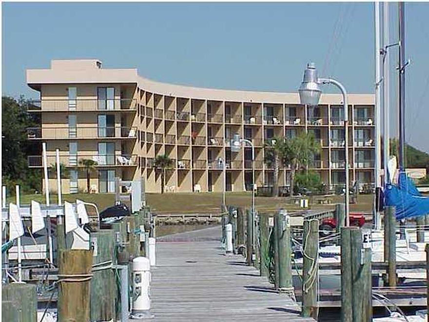Convenient & Handicap Accesable 1st floor Studio steps from pool,dock,marina,BBQ & picnic area boasts unobstructed views of Intracoastal Waterway. Fully furnished unit has 26' Boat slip which may be rented for additional income. Association Dues cover :Water,sewer,trash,Cable w/2HBOs, Wireless HiSpeed Internet,Wifi,basic telephone service, Insurance on the Building exterior,grounds, pools & marina. nice vacation destination or investment. On site management office in this well maintained comple
