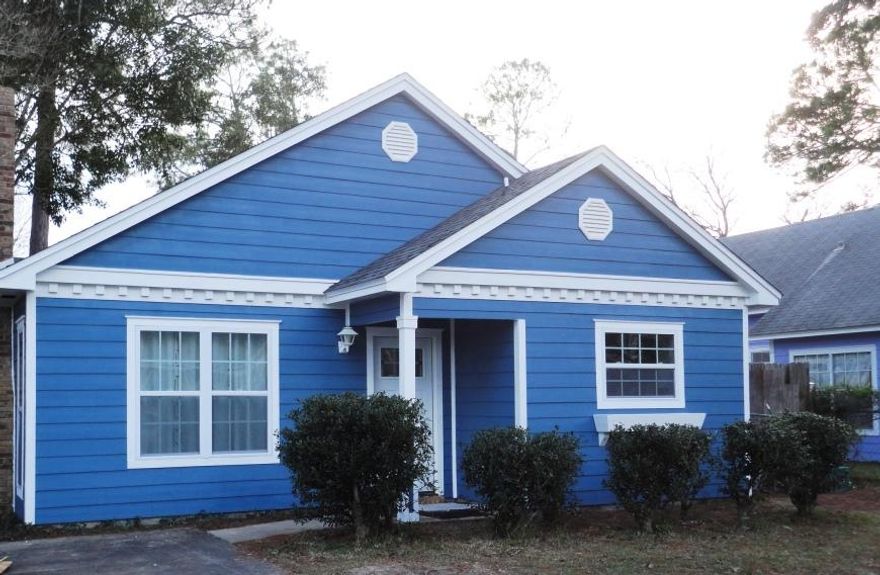 This lovely Florida cottage has been completely remodeled! This house is adorable and available! The owners have lovingly remodeled this home inside and out. This charming home boasts a brick fireplace and a cottage dcor including a slatted ceiling. There are vaulted ceilings and decorative architectural accents. The owners have added all new flooring...lovely laminate floors in the main area, carpet and gorgeous tile in the bathrooms. There is also new lighting throughout the house, including under cabinet lights in the kitchen. The generous kitchen has plenty of counter space and all the appliances convey too. There are three bedrooms and two full baths. The master bedroom has a walk in closet and a newly renovated bathroom.