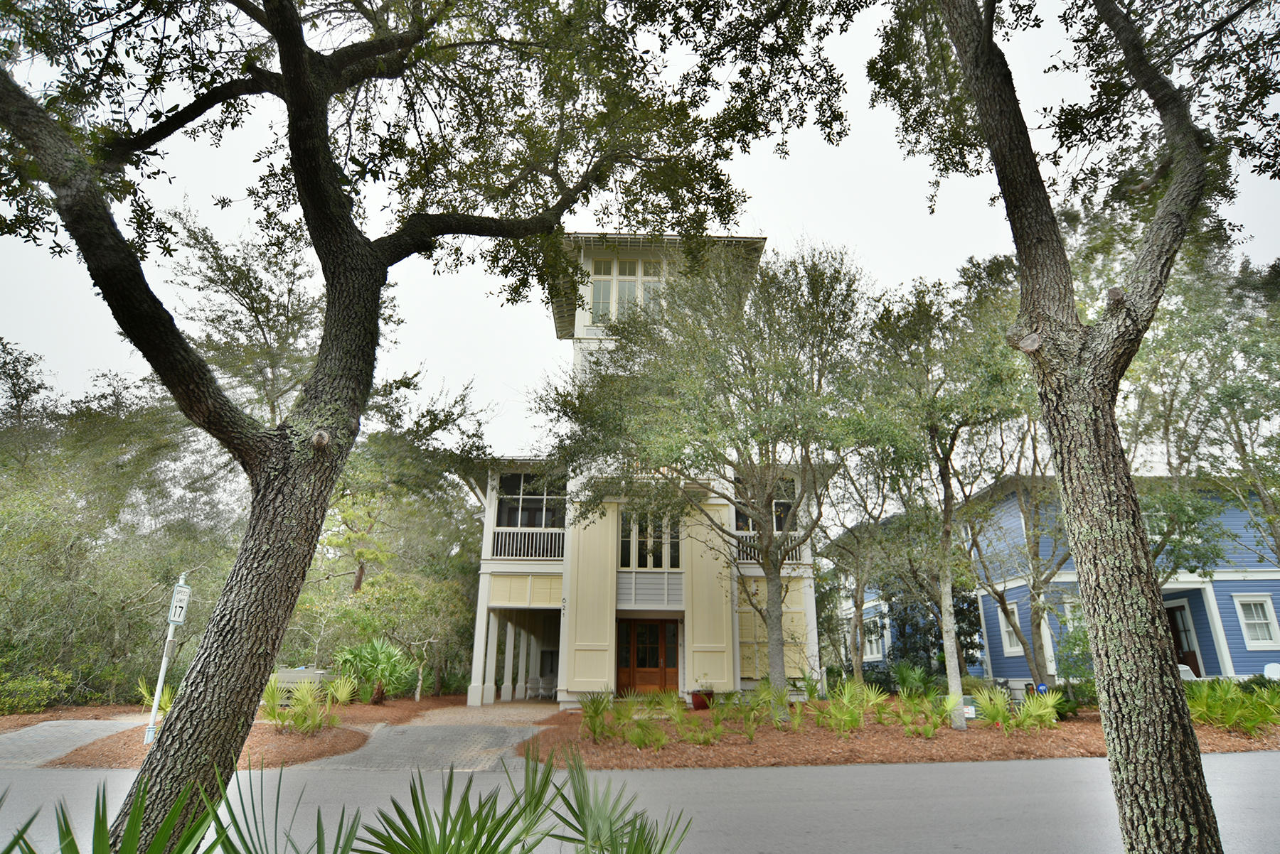 This gorgeous home was designed by Jim Strickland of Historical Concepts and built by Paragon Builders. It is located in the heart of Phase I of WaterColor right by the Amphitheater and Boat House. This home is 3,121 square feet and boast 4 bedrooms and 4.5 baths with beautiful Lake and Gulf views and a private back yard. The heart of this home is the 2nd floor living area with vaulted ceilings that opens to the kitchen as well as a screened porch with fireplace. Each bedroom has it's own private screened-in balcony as well. Top of the line finishes throughout the home include: custom cabinetry, honed marble countertops, Wolf Range, Sub Zero refrigerator, antique heart pine flooring throughout, wood ceilings and walls, wet bar in the Great room, outdoor fireplace, sleeping loft, and a