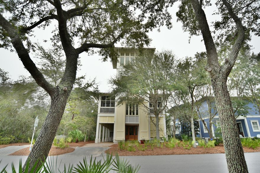This gorgeous home was designed by Jim Strickland of Historical Concepts and built by Paragon Builders. It is located in the heart of Phase I of WaterColor right by the Amphitheater and Boat House. This home is 3,121 square feet and boast 4 bedrooms and 4.5 baths with beautiful Lake and Gulf views and a private back yard. The heart of this home is the 2nd floor living area with vaulted ceilings that opens to the kitchen as well as a screened porch with fireplace. Each bedroom has it's own private screened-in balcony as well. Top of the line finishes throughout the home include: custom cabinetry, honed marble countertops, Wolf Range, Sub Zero refrigerator, antique heart pine flooring throughout, wood ceilings and walls, wet bar in the Great room, outdoor fireplace, sleeping loft, and a