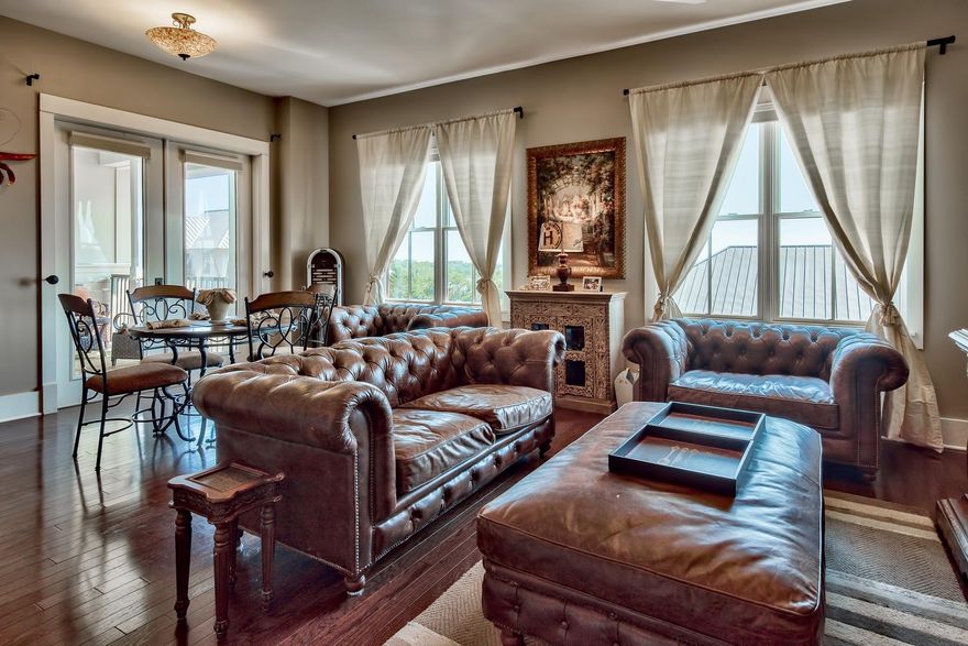 Perfect opportunity to make this 3 bedroom, top floor Redfish Village condo with gulf views your own. Hardwood floors, raised ceilings, granite counter tops and stainless steel appliances are a few of the features offered. An open concept among living and dining spaces and the kitchen creates a warm environment for relaxing and socializing. Kitchen island supports dual sink, dishwasher and spacious breakfast bar. Large windows in the living/dining area ushers in natural light. A bunk room sleeps four and is perfect for the kids. The balcony overlooks the Village's activities and offers gulf views.