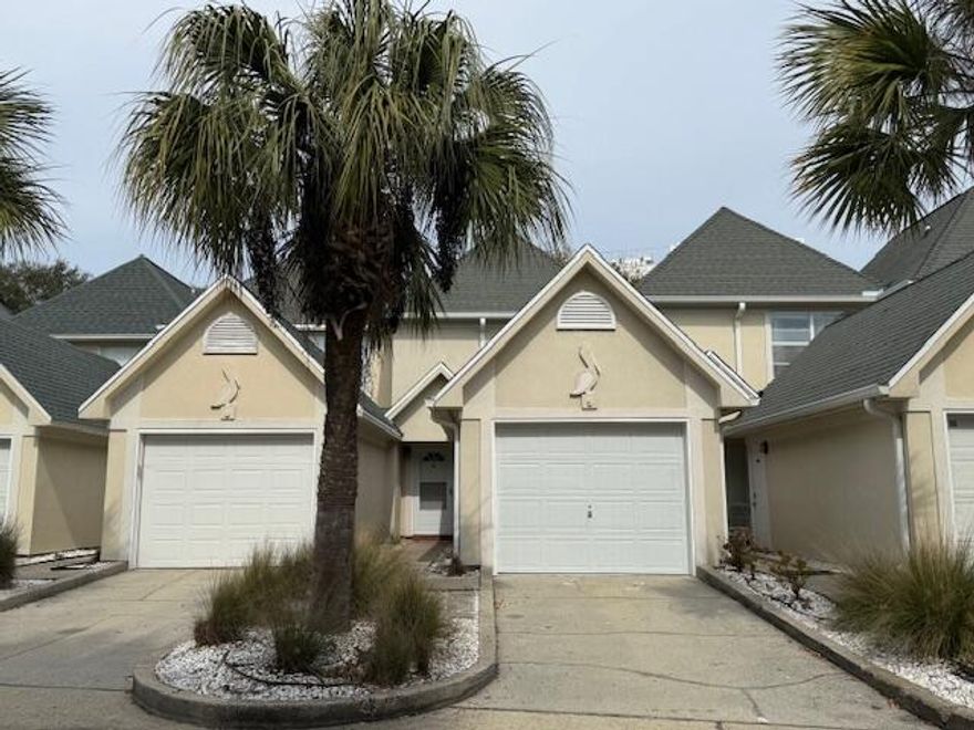 $500 off March rent if occupied by Mar 1!!   Spacious Townhouse with convenient parking and community pool; centrally located in the Destin Harbor District  minutes to the Harborwalk, restaurants, schools, beaches & military bases.  The open living area includes a living room, dining room, kitchen & half bath and opens to an outdoor patio. The two bedrooms are upstairs. Primary bedroom has vaulted ceilings & includes ensuite bath, large walk-in closet & large vanity. Fans and blinds are in all rooms. Washer/Dryer included. Separate 1 car garage with extra storage and an additional dedicated parking spot.  Non-smoking.  Yard maintenance and trash pickup included in rent.  All other utilities paid by tenant. A small dog considered with $500 non-refundable fee.