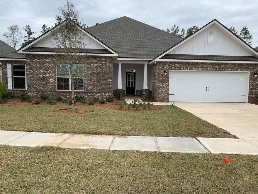 The TAFT IV G in The Trails at Hammock Bay community offers a 4 bedroom, 2.5 bath bathroom, with an open design. Upgrades include luxury wood look tile flooring, blinds, quartz counters, upgraded cabinets and more! Special Features: Private water closet, double vanity, soaking tub, separate shower, walk-in closet in the master suite, covered rear patio, recessed can lighting, ceiling fans in living area and all bedrooms, framed mirrors for all bathrooms, undermount sinks, bronze plumbing fixtures, smoke and carbon monoxide detectors, garage door with hardware and two remotes, seasonal landscaping package, architectural landscaping package, 30 year shingles and more! Energy Efficient Features: Gas appliance package, Vinyl Low E MI windows and more!