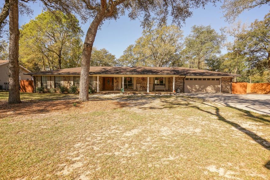Rocky Bayou all brick pool home on 1/2 acre fenced lot. This home has over $115,000 in upgrades in recent years to include new in-ground pool with hot tub and screened enclosure. Featuring over 2900 square feet of living space, 4 bedrooms, 3 full baths, living room, dining room, updated kitchen, brick fireplace in large living room with new carpet and built in glass book shelves, wonderful sun room that leads to the inground pool. The back yard is an oasis with multiple swings, pergola, large gazebo with electric, new gutters overlooking the Rocky Bayou Country Club golf course. ZERO popcorn in this spacious home which also features crown molding, NEST, wifi enabled security system, upgraded insulation, renovated garage with professional epoxy floor. One bedroom has built in custom
