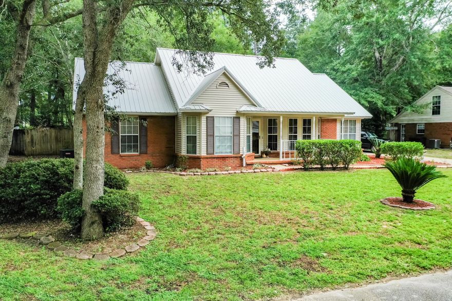 Affordable, Adorable, and Accessible! Located on the south side of Crestview, south of I-10. The tiled Foyer opens to both the Dining Room with French doors and the Great Room that has a Vaulted Ceiling and corner, gas Fireplace. Popular wood look tile flooring except in the carpeted Bedrooms and Bonus Room. Kitchen is fully equipped with all appliances and is accented with a beamed Cathedral Ceiling. 1st floor Master Bedroom Suite is complete with Walk-in Closet, Separate Shower, whirlpool Garden Tub, and double vanity. Upstairs Bonus Room could be used as 4th Bedroom. Screened Porch opens to the Privacy Fenced Back Yard. Stove is electric but there is a gas hookup if you prefer a gas stove. Home Warranty provided by the Seller, a $450 value. Be sure to take a look at this Home! Sprinkler system is not operational-''AS IS''.