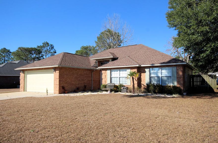 Beautiful home in desired South Crestview! Bright open Foyer leads into an inviting Formal Dining Area and Living Room. Living Room features trey ceiling and wood burning Fireplace. Large Kitchen sits off of Living area, with lots of space to entertain! Tons of cabinet storage and Pantry! Kitchen features granite counter-tops, tiled flooring. Breakfast Nook off Kitchen for additional dining space. Separate Laundry Room located next to Garage. Master Bedroom has trey ceiling and plenty of room for all your furniture without feeling cramped. Master Bathroom has large walk-in Closet, double vanity,granite counter-top,and garden tub. Additional Bedrooms are nicely sized and hallway bath features granite counter-tops as well. Large level lot, a plus for South Crestview! This home is a must see!