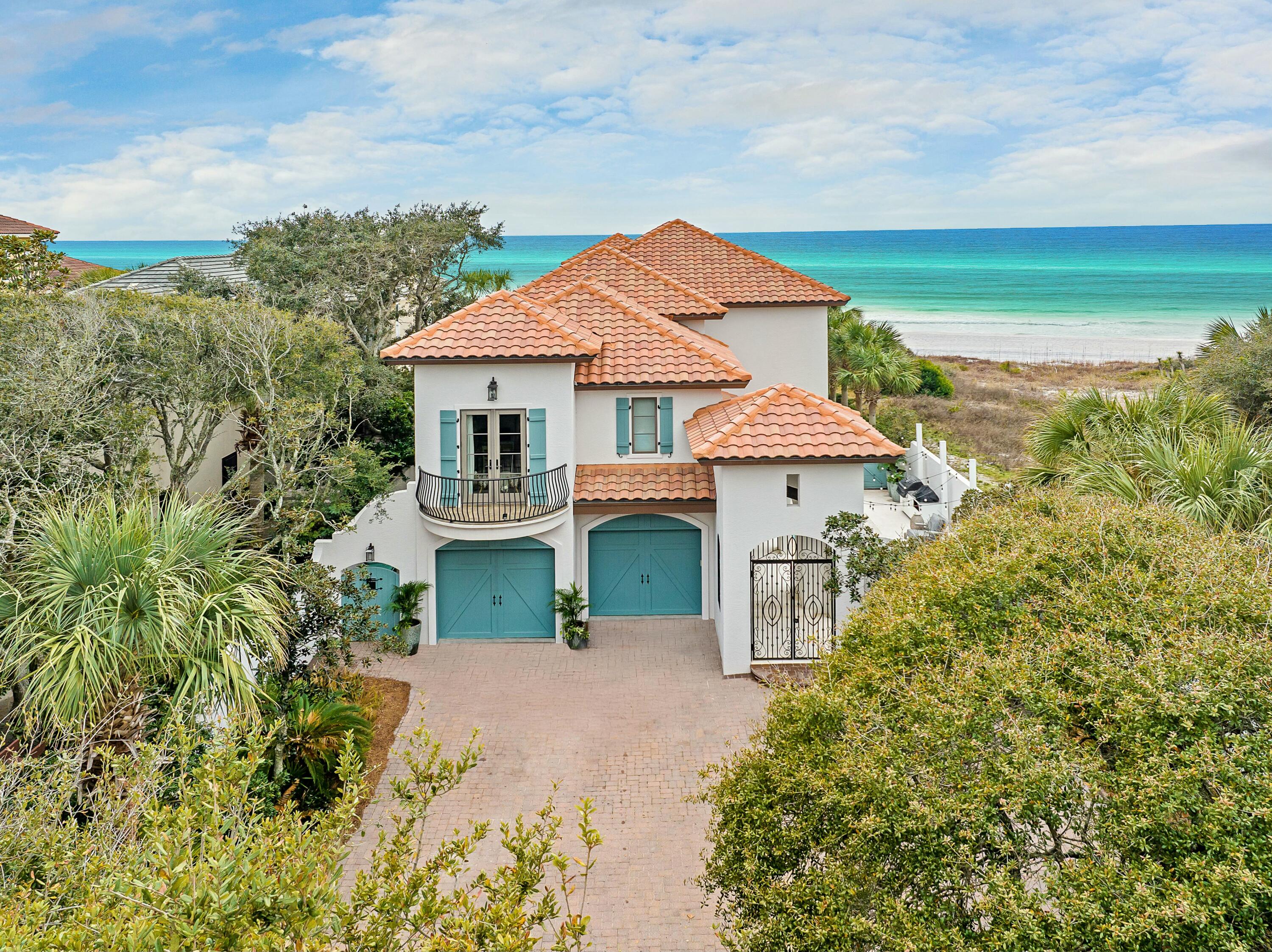 A rare opportunity in exclusive Shell Seekers Cove, this stunning five-bedroom, five-bathroom gulf-front villa offers the ultimate in coastal luxury. Spanning 4,452 square feet on a generous 0.38-acre lot, this exquisite home is a true beachfront sanctuary, where timeless architecture meets modern innovation.  Enter through a charming courtyard framed by graceful arches and gas lanterns, where a tranquil pool and fountain set the tone for relaxed coastal living. Inside, an open-concept design showcases breathtaking gulf views through expansive walls of windows. Chiseled stone floors, coffered ceilings and a fireplace create an inviting living space, while the gourmet kitchen features premium appliances, ample counter space and seamless flow to the dining area. The second level offers two luxurious master suites with private balconies overlooking the gulf  perfect for soaking in the sea breeze and endless sunsets. Two additional ensuite bedrooms provide comfort for guests or family. Throughout the home, thoughtful details shine, from intricate ceiling designs to impact-resistant glass windows and doors.  

With modern technology at its core, the home has geothermal heating and cooling and a whole-home natural gas generator for energy efficiency and peace of mind. Outdoor living is effortless, with expansive covered patios, a private boardwalk leading directly to your secluded beach, and endless space for entertaining.  

A two-car garage adds convenience, while the private pool and no HOA restrictions make this property ideal for use as a primary residence, vacation home or luxury rental. Located moments from Gulf Place and the best of 30A's dining, shopping and activities, this villa offers coastal elegance and modern comfort  making every day feel like a getaway.  
