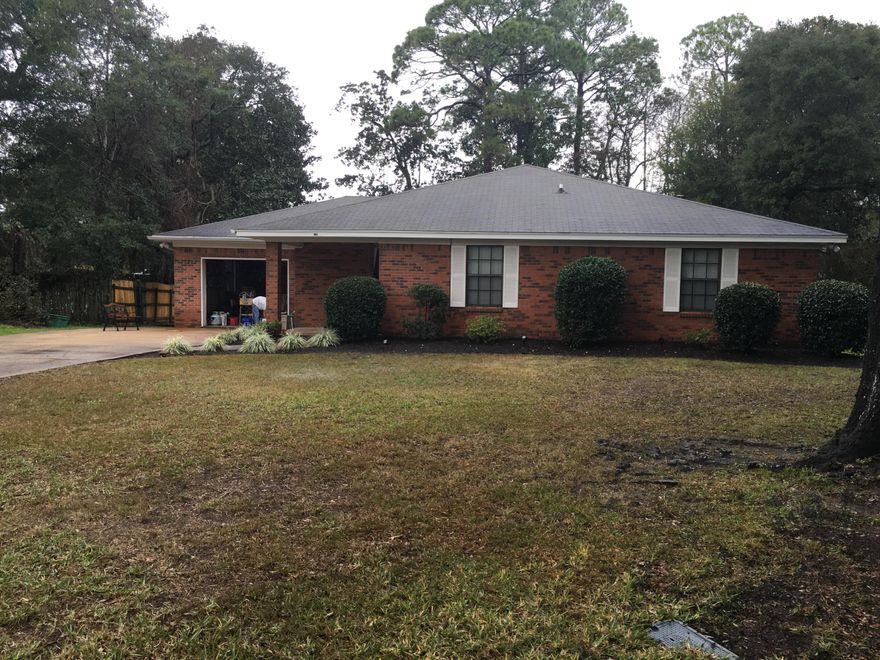 Set at the back of a quiet cul-de-sac in central Niceville, this charming, 3 bedroom, 2 bathroom brick ranch-style home sits on a private, 1/3 acre lot. Recent upgrades include: full interior PAINT in a fresh, neutral tone, TILE in the bathrooms, kitchen and laundry room, and new LIGHT FIXTURES. Upon entering, find two roomy bedrooms that open up to a spacious great room and formal dining area. An eat-in kitchen with updated tile backsplash and stained cabinets is adjacent to the great room and dining area as well as the separate laundry room. An extra-large one-car garage gives access to usable attic storage via a pull-down ladder. Enjoy your lush backyard from a gracious covered deck - perfect for entertaining! A+ Nicevilles schools and an easy drive to Eglin, 7th Group, Destin Beaches!