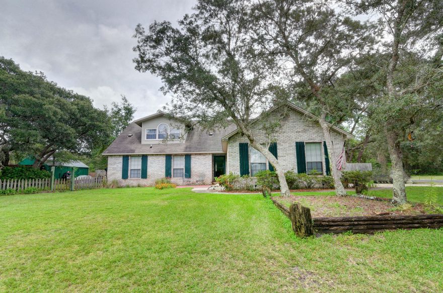 Fantastic home on a large corner lot in a great neighborhood without an HOA! Recently updated with new tile in the kitchen and living area. The kitchen also features all new appliances. Enjoy quiet evenings next to the fireplace in the living room. The first floor master bedroom is complete with a large closet and an en suite bath! The two car garage, storage shed and attic offer plenty of room for storage. A perfect home for outdoor living on the patio and huge fenced back yard. Ideal for cookouts and playing catch!