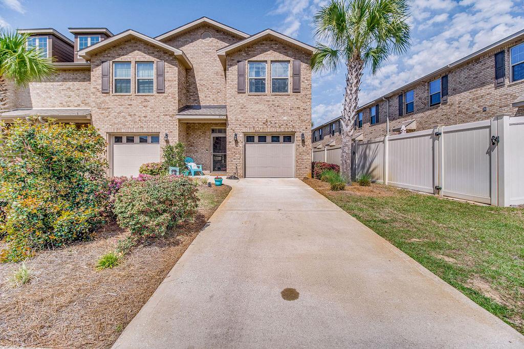 STUNNING townhome only 1.5 miles from the Sugar White Sands of Navarre Beach, in the coveted Reserve Pointe. LVP flooring on lower lever and wet areas, carpet in all bedrooms. Coveted CORNER unit with plenty of light! Fenced backyard; stainless steel appliances, kitchen has beautiful dark wood cabinets and granite countertops that extend to a breakfast bar for extra seating! Large Master w/ walk-in closet, upgraded with custom closet shelves in all rooms. Master bath also has large double vanity. Half bath downstairs & garage has mounted shelving. Beautiful community pool, picnic area, & fun playground for the kids! Great location w/ shopping, restaurants and minutes away from Navarre Beach! Call now to check out this Gem!