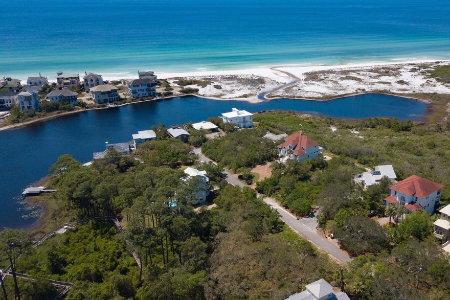 CURRENTLY UNDER CONTRACT - SELLER ACCEPTING BACK-UP OFFERS. Over 1/4-acre homesite south of 30A on the desirable west end! Tucked away in the sought-after community of Beach Highland, this is the perfect place to construct a new private beach residence, a stunning spec home for resale, or a lucrative rental investment property. This unique property offers a deeded easement to the boardwalk at its rear boundary, which runs through wooded groves to a lakefront deck and kayak launch on Lake Stallworth. Convenient beach access is located 1/2-mile away on the south side of Lake Stallworth, or via the Dune Allen beach access with parking and an accessible ramp just 1 mile to the east. Buyer to verify lot dimensions and easement of record. Information is deemed reliable but is not guaranteed.