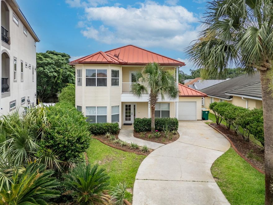 Welcome to 2388 Palm Harbor Drive -- a beautifully updated home in a highly desirable waterfront community just off Beach Drive. This beautifully maintained home features rich hardwood floors throughout the main living spaces and an open-concept layout designed for effortless entertaining. The spacious living room centers around a cozy fireplace, creating a warm and inviting atmosphere, while each generously sized bedroom includes its own private en-suite bathroom  ideal for both comfort and privacy. The primary suite is located on the main floor and features a large walk-in closet.

Upstairs, you'll find fresh carpet in the bedrooms and hallway, along with all-new exterior doors and stylish light fixtures throughout the home. The large laundry room offers plenty of space for storage and functionality. A durable metal roof, updated outlets and switches, and a second-story balcony overlooking picturesque Palm Harbor are just a few more features that make this home stand out.

Conveniently located just minutes from Publix and other local amenities, this home balances tranquility with accessibility.

As a bonus, the property includes a private boat slip on Garniers Bayou, located at the end of the dock in the deepest part of the water  perfect for deep-hulled vessels and anyone seeking true waterfront living.