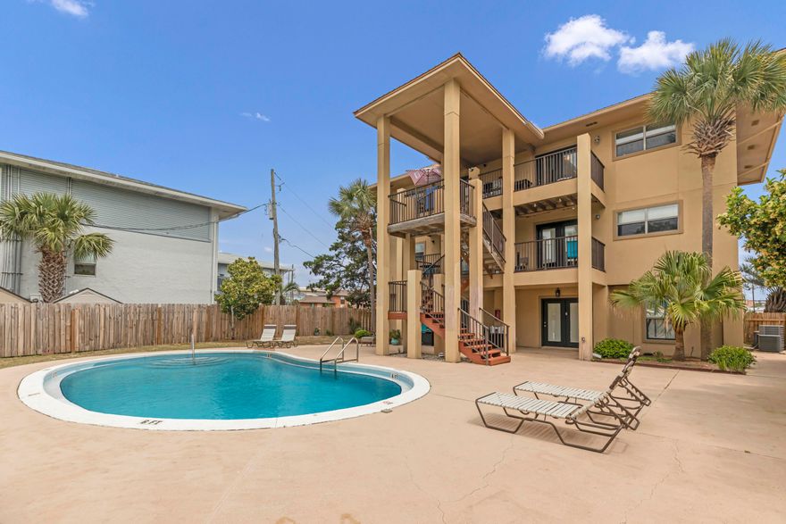 Interested in buying your next vacation home that makes you money while you're away? This turnkey short-term rental is a savvy investment, with over $45k in gross revenue, just a 2 minute walk to the stunning Gulf of Mexico! Stainless steel appliances, elegant crown molding, and the convenience of a washer and dryer included. No need to worry about furnishing your new investment - all furniture, linens, and amenities will convey. French doors lead to your patio, where you can relax and enjoy tranquil views overlooking the sparkling pool. Island Palms Condos allows you to self-manage, primed to bring in top dollar as a sought-after vacation rental. Don't miss this opportunity to own a slice of paradise that pays for itself. Schedule your viewing today!