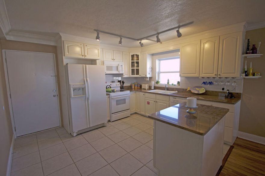 RARE OPPORTUNITY!!This End Unit has a view of both the Gulf and the sound. You have a great open floor plan from the kitchen to the living room. Kitchen has plenty of cabinet space. With two extra windows in the living room area you will enjoy the extra natural light.Sliding glass doors from the living room area allow you to enjoy the view of the gulf, or watch the kids play on the grassy large area between buildings. Being an end unit you will have 100 sq. ft. more space than other units and you notice it in the bed room areas. you will find upgrades throughout the unit. New AC unit in 2017, new hot water tank.Two Bedrooms and two full baths make this a great 2nd home or investment property.Resting on 13 + acres El Matador is beautifully landscaped and Manicured.