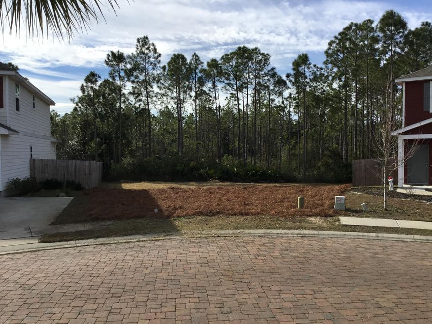 Last lot in this beautiful cul-de-sac subdivision. Private road with sidewalks, underground utilities and street lamps. Walking distance to County access on Choctawhatchee Bay. Great place for a young family or retirees looking to be close to the beaches. two miles to Beautiful 30-A and just minutes to the hospital, Grand Boulevard, Sand Destin, Publix and Wal-Mart. Water and Sewer Tap Fees have already been paid with this lot and will be conveyed to Buyer at closing with payment of $7500 assignment fee (a $1500 discount off of current tap fee cost). Lot backs up to preservation area owned by HOA so no neighbors in your back yard!