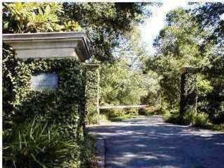 Redfish Lane is a gated exclusive enclave of only 17 lots. It is located on the south side of Scenic Highway 30-A alongside Little Redfish Lake. The setting is unique, situated amongst indigenous landscaping with private access to Little Redfish Lake and the Gulf of Mexico. This lot is over a half acre and offers lake and gulf views from both the second and third floors. No short-term rentals are permitted. The tree survey has already been completed. Approved preliminary house plans designed by Jim Strickland of Historical Concepts take advantage of the gulf view. Plans can convey with the sale. There is no build out time requirement.