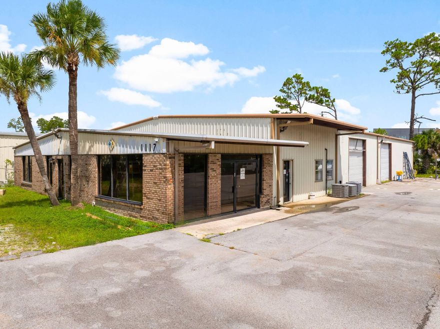 This industrial warehouse offers 7,200 square feet of adaptable flex space, thoughtfully designed to support a variety of business operations. Inside, the property features three private offices, two spacious showrooms, two bathrooms and a kitchenet. Outside, a large yard provides additional utility and storage options, complemented by ample parking designed to accommodate utility vehicles with ease.Strategically positioned at the front entrance of Sweet Bay directly off Highway 390, the site enjoys excellent visibility and exposure to approximately 22,500 vehicles each day. This high-traffic corridor ensures strong brand presence and accessibility. Altogether, this warehouse represents a compelling net investment opportunity in one of the area's most visible and convenient locations.