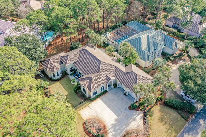 Captivating Single Story Sandestin Home! Beautifully remodeled to include 4 bedroom and 4.5 bathrooms with 3452 sqft - all on one level. Enter the foyer with 20' ceilings and then into an amazing open entertainment oasis with dining, kitchen and living area (with room to dance) covered with new wood look tile, and a courtyard on each side. Modern kitchen w/Monogram and Bosch appliances, custom cabinets throughout, large kitchen island with a farmhouse stainless sink and gorgeous granite w/room to seat 6, step right outside to grill or enjoy outdoor dining. Adjacent is the light & bright living area with a wall of windows flowing to the second patio/courtyard over looking the neighborhood green space. Beautiful furnishings available outside of home purchase. Master bedroom has a pair of corner windows and then leads into a glorious master bathroom with double sinks plus a makeup station, modern soaking tub and separate large tiled shower. There are 3 additional bedrooms, the front one is large enough to double as a seating area, both the 3rd and 4th bedrooms are ensuite with their own full bath. This is a insulated concrete form construction custom home that was additionally customized by the current owners a MUST see! Anderson windows throughout, geothermal heating & cooling system for lower power bills, large attic, 800 sq. foot garage with storage room, sprinkler system for the lush and mature landscaping. 
Enjoy all that Sandestin Golf and Beach Resort has to offer, it is a major destination for all. This resort spans over 2,000 acres and features miles of beaches as well as bay frontage, 4 golf courses, tennis center, 2 resort pools, marina, fitness center and The Village of Baytowne Wharf, a pedestrian village with dining, shopping and events