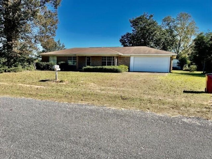 Don't forget the horses!!!  Nearly 3 acres of beautiful ,level, cleared field. All brick home that is being sold ''as is''   Needs updating but  in a great location  Huge mature trees add much character to the property...no value given to the shed in back....could possibly be turned into stalls.  Three bedrooms and two full baths.  Large front porch while a sunroom is on the back.  Washer and dryer convey in the large utility room with a long counter and cabinets.  Hip roof.