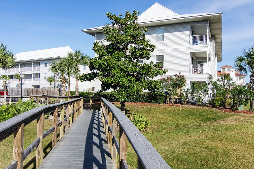 This spacious 1152 square foot condo has three bedrooms and two and a half baths, making it prime for use as a second home or vacation rental. The white sandy beach is just a short traffic-free stroll away while the community pools (one heated), lighted tennis courts and clubhouse activities are right outside your door. Bathed in cool neutral colors with a tile floor laid diagonally, this well-planned condo maximizes its space with an open plan L-shaped living/dining/kitchen and full-height patio doors. The private balcony beckons for sunset drinks and outdoor dining. Sold fully furnished, it has everything you need to enjoy this popular family-oriented resort.
