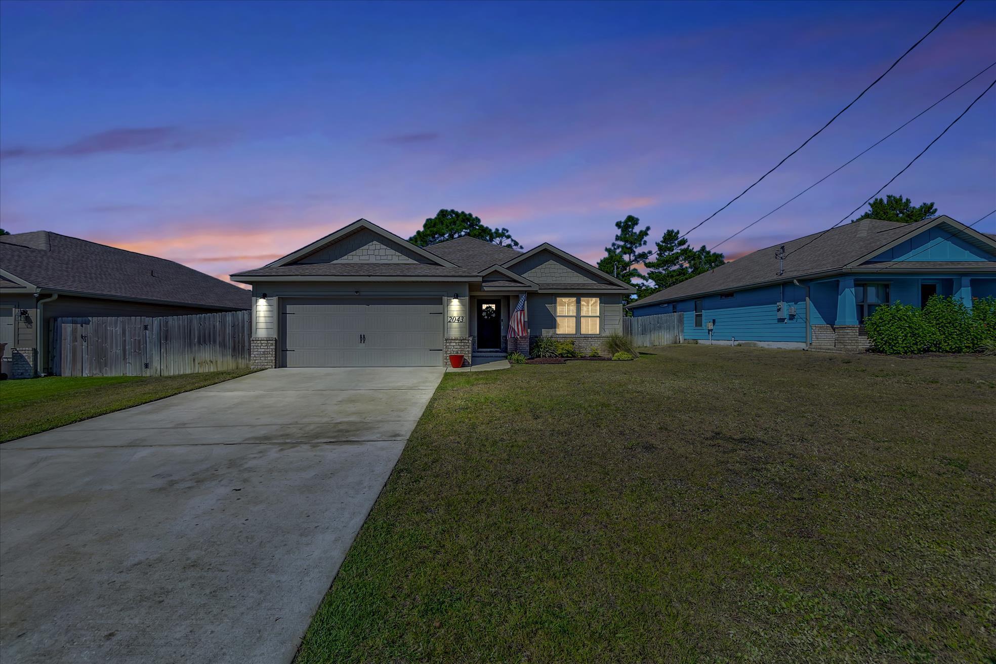 Look at this lovely, 4 bed/2 bath custom home. Located in a great central location with quick access to Navarre Beach, shopping, and Highway 98 to Hurlburt Field AFB.   You are welcomed with a walk-in foyer that leads to your open floor plan. Large kitchen with crown molding, custom staggered cabinets, and gorgeous granite countertops. Tile is used in the entryway, main living area, laundry room, and bathrooms. There is an undermount sink, stainless steel appliances, a center island, and an open layout to the family room and eat-in area. Large master bedroom with fan and tray ceiling. The master bathroom has a sizable step in tub/shower, a double vanity made of cultured marble, and antique brass fixtures. Additional bedrooms are a nice size and have double closets and ceiling fans.