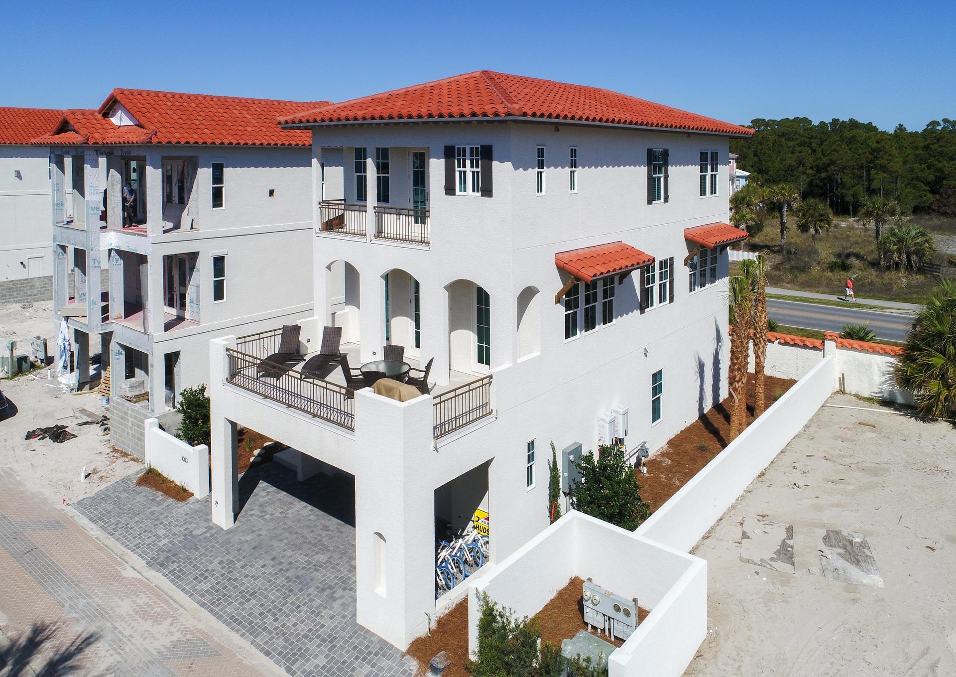 Vizcaya is a gated, 32 home, beach community with Mediterranean architecture. The proximity to the beach, multiple neighborhood beach walk overs, quiet,private beaches and exquisite architecture make it one of the most desired communities on 30A. This newly constructed custom home has an amazing gourmet kitchen, beautiful hard wood floors, elevator, and too many other upgrades to mention. Attached is a list of features which are normally only found in custom homes affording the buyer the benefit of a custom home without the hassle of construction. The home is on the 360 Blue rental program (no rentals prior to Memorial weekend) projecting income for 2017 of $130,000 or more. It can be removed if buyer doesn't wish to rent. Fully furnished and move in ready! (See also financing doc)