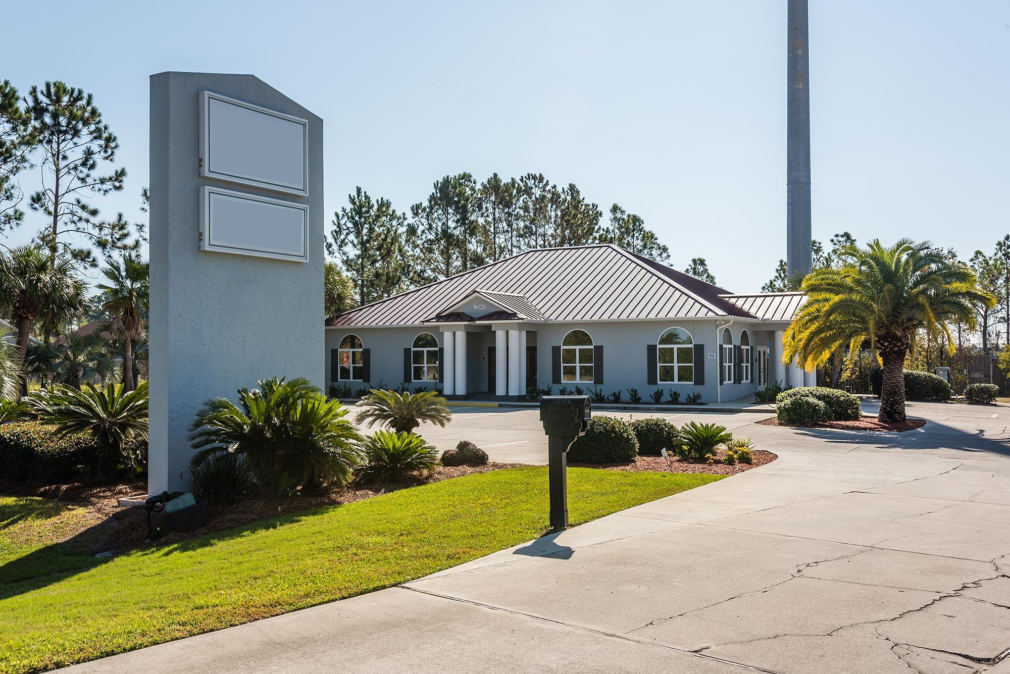 Newly renovated medical office with excellent access for Bay and Walton County patients! This office space recently underwent a $300,000 interior and exterior renovation with every surface touched to create a fresh, new coastal feel.The space consists of a large, open reception and waiting area, six exam rooms, three private offices, a generous sized kitchen and break room area, triage station, multiple common area desk spaces, an additional brake room and storage space, and two half baths and 1 full bath. The exam rooms could easily be turned into additional private offices if needed for a different application.