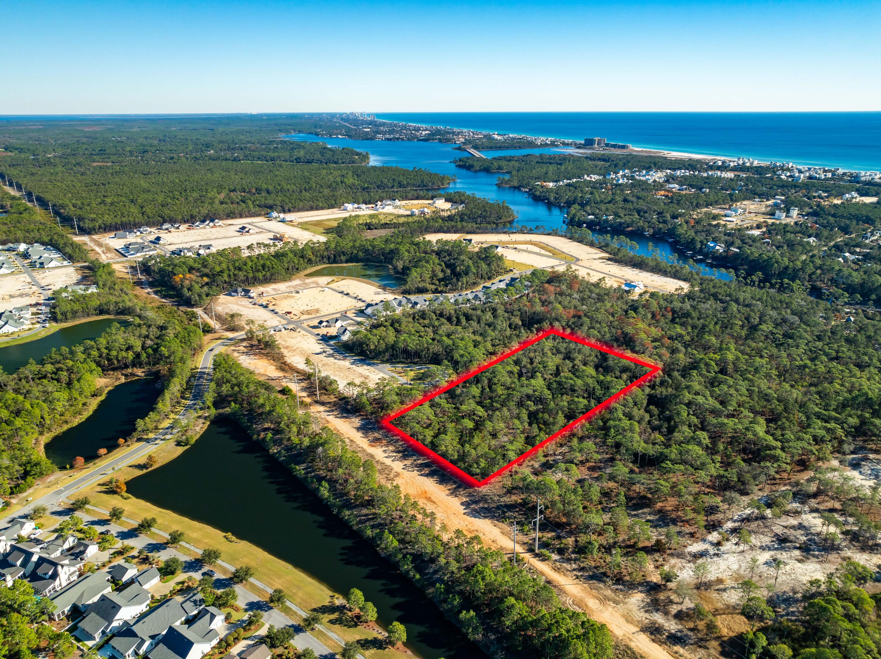 Nestled in the desirable Inlet Beach area, this expansive 5-acre parcel is located adjacent to St. Joe's newest phase of the WaterSound Origins community. The property is zoned Conservation Residential, allowing for up to two homes per acre, offering both space and flexibility for development. Just a short walk from the tranquil shores of Lake Powell and a quick drive to the stunning Gulf Coast beaches, this location provides an ideal blend of natural beauty and convenience.Enjoy easy access to an array of shopping and dining destinations in Rosemary Beach, Alys Beach, Seacrest, Inlet Beach, and 30Avenue, as well as the renowned Scenic Highway 30-A. Situated on northwest Florida's picturesque Gulf Coast, this property lies between the vibrant towns of Panama City Beach and Destin, making it a perfect spot to enjoy all the region has to offer.