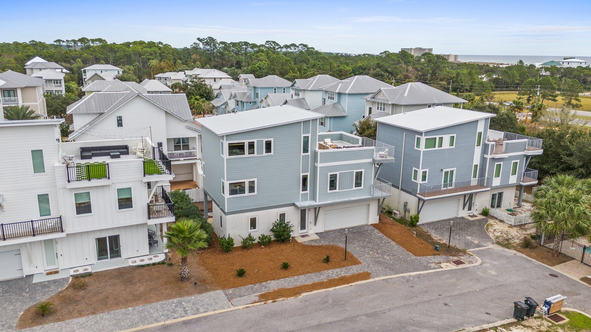 Discover coastal living at its finest in this exquisite 4-bed, 3.5-bath home nestled in the heart of Inlet Beach, Florida. Ideal for both savvy investors seeking a lucrative short-term rental opportunity (OVER $150,000 annually) and discerning individuals seeking a perfect personal residence. Boasting contemporary design and panoramic scenic views, this residence offers a spacious interior, gourmet kitchen, and two private master suites. Enjoy the serenity of coastal breezes from the expansive rooftop deck or take a short stroll to pristine beaches. With upscale finishes and proximity to local 30A attractions, this home embodies luxury coastal living in one of Florida's most sought-after communities.