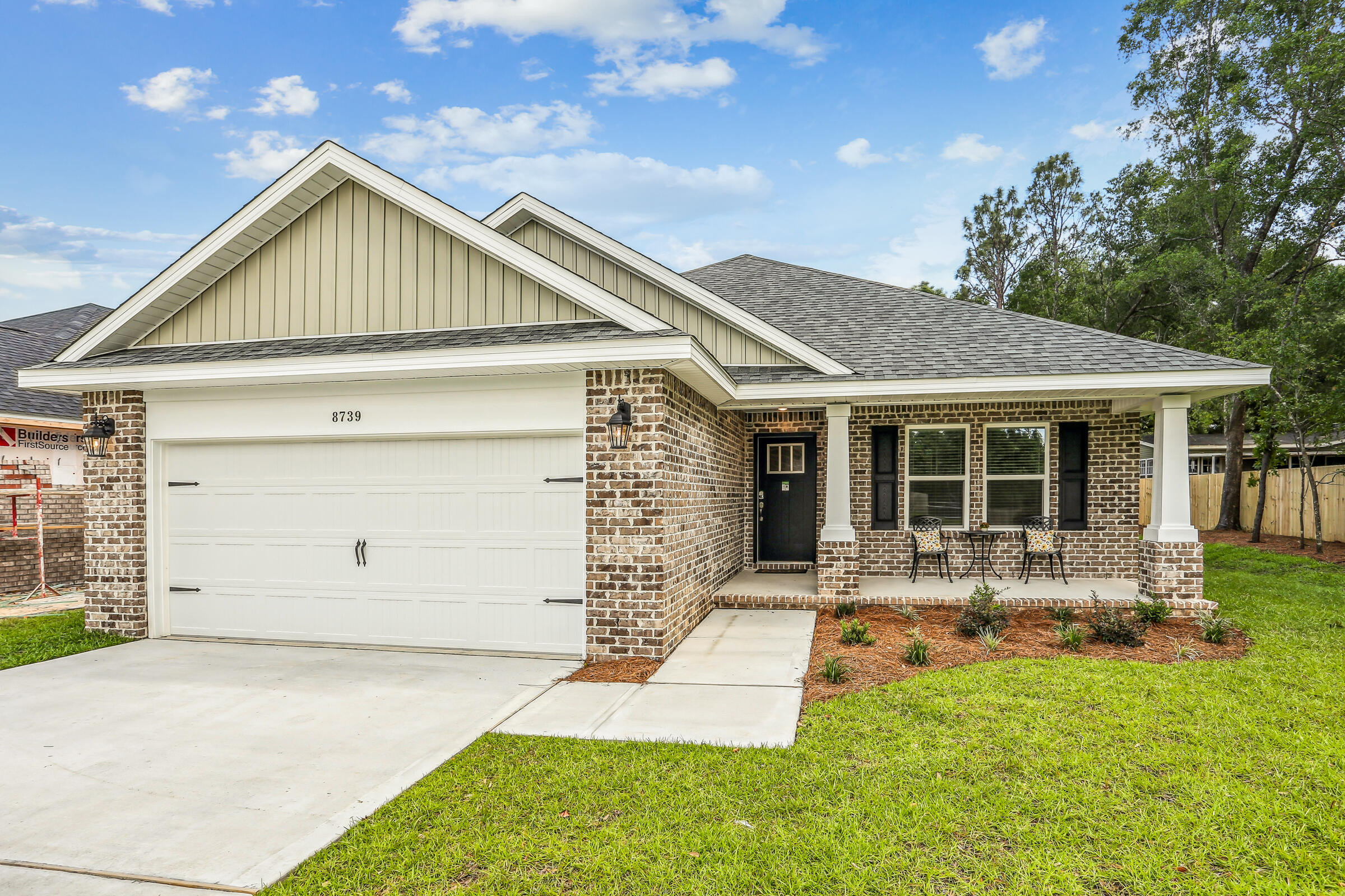 Welcome to the Carlos Floor Plan in Clearwater Landing! This beautifully designed 3-bedroom, 2-bath new construction brick home sits on a spacious 1.01-acre lot in a private East Milton community. The open layout features vaulted ceilings and a split floor plan, perfect for everyday living and entertaining. The gourmet kitchen includes stainless steel appliances, granite or quartz countertops, soft-close cabinets, under-cabinet lighting, bar seating, and a large pantry.The luxurious master suite offers double vanities, a garden tub, a fully tiled walk-in shower with dual shower heads, and two walk-in closets. Additional features include a whole-house blinds package, brushed nickel hardware, and quality finishes throughout.Clearwater Landing is an exclusive 11-home community, with every lot offering at least 1 acre and select lots over 3 acres. Ideally located between Navarre Beach and Pensacola, this home combines space, privacy, and craftsmanship. This home will be move in ready on 10/1/2025