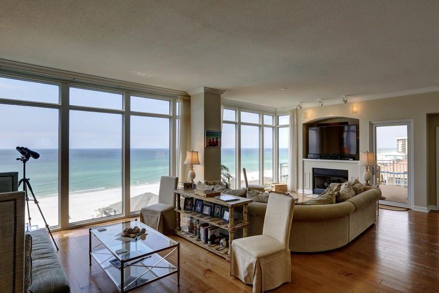 LOCATION IS KEY! If you've been looking at condos and they all start to blend together, then you need to experience this one! Located in one of the premier condos in Panama City Beach on the 5th floor with absolutely stunning views of the Gulf from every room! AND fabulous sunset views from the west balconies make this condo the one that stands out! In addition to the views, this beautiful, never rented condo has a separate 1 bedroom apartment that can be locked out for guests, overflow family, or rental. After entering the vestibule of this west corner unit you have separate doors for the main unit and the apartment. In the main condo your eyes are drawn to the wall of windows which accentuate the emerald waters of the Gulf! A large workable kitchen, dining room, and two sitting areas in the living room all emphasize entertaining and enjoying the sunny Florida weather. One conversation area with casual elegant loveseat and skirted parsons chairs and second area with comfortable sectional, inviting gas fireplace and a 65" 3D Smart TV.  Two master bedrooms, one with the stunning gulf views, ensuite master bath with double sinks, jetted tub, and separate shower and a second master on the western corner with ensuite bath with double sinks, jetted tub, and separate shower. Both this bedroom and the living room have access to the corner balcony-the perfect place to enjoy the peaceful & serene sunsets. The third bedroom features a queen bed, extra long twin bed and adjoining bath.  The separate entrance apartment is a special bonus that can be rented separately or used for guests. The one bedroom unit with kitchenette features its own balcony, chic Paula Dean bedroom suite and adjoining bath with double sinks, jetted tub and separate shower. After purchasing in 2012 the owners did extensive renovations including paint, new flooring, furnishings, and custom window coverings which include black-out curtains in bedrooms. Sterling Beach Condo offers an exercise room, movie theatre, community room, heated pool, grills, on-site security cameras and on-site rental company. (See rental projections in documents.) Come see this one of a kind condominium!