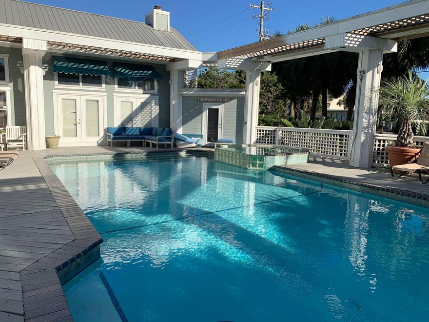 Awesome Opportunity for renovation or redevelopment. Spacious beach house is situated on 3 lots, 2 50 x 150 and one behind  the 2 lots that front Scenic 98  in the ever popular Crystal Beach.  Tarpon Beach access is just over 100 ft from the property.   Over 9,000 sq. ft under roof overlooks courtyard pool & has views of the gulf. Just steps to the public beach access. Home would make an awesome vacation rental.  Could expand # of bedrooms and you have plenty of parking .  The main home offers imported Mexican tile, large breakfast bar & built in office. The separate guest quarters is complete with full kitchen, bedroom & bath. The 35x20 pool is the heart of it all offer diving board,  & two saunas. Endless Possibilities! Property is being sold ''as is''
