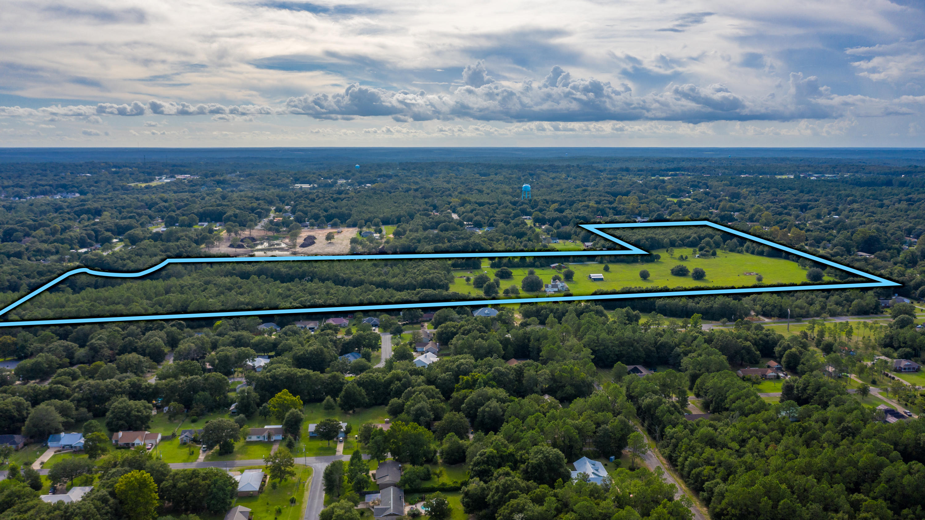 Development opportunity in the Grandview Subdivision. Mostly cleared land centrally located in Crestview. Approx. 46.52 acres with approx. 800' of lake front footage. Seller is willing to deed a portion of parcel number04-3N-23-3000-000C-0290 to accomodate access from the Pinewood Ln.