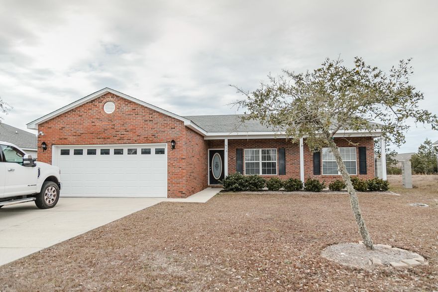 THIS IS A MUST SEE: completely updated and renovated in 2018 (+ 50K invested), with  new kitchen with quartz counter top, new refrigerator, and dish washer.  New tile floor and wood trimming all over the house,  bathrooms completely redone, fireplace with travertine finishing. New blinds and window treatment. The AC was replaced in 2018,  and the lot is deep enough to build a pool, park your boat, RV, etc.  If you want a fenced backyard, the hurricane proof cement posts are already there. No HOA fees.