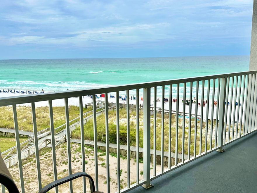 Welcome to Shoreline Towers Unit 2054, a stunning beachfront condo located on the fifth floor of Tower Two in the heart of Destin!  As part of a recent $25 million renovation by Shoreline Towers, the condo boasts brand-new sliding glass doors, windows and beautifully restored balcony. &#8232;The community has upgraded landscaping and security features for peace of mind.This spacious 2-bedroom, 2-bathroom unit is designed for comfort and relaxation, making it the perfect beach getaway.Step into the master bedroom, where you'll find a luxurious king-size bed and a 32'' flat-screen TV for your entertainment. The guest bedroom offers two cozy double beds, also equipped with a flat-screen TV, making it ideal for families or friends. In the living room, you'll enjoy lounging with a large flat screen TV, perfect for movie nights after a day at the beach.

The kitchen features an open floor plan with tile countertops and a convenient breakfast bar, providing a perfect spot for casual dining. You'll appreciate the stackable washer and dryer located in the kitchen pantry for added convenience. The master bath boasts a walk-in shower with a safety bar, and the entire unit is tiled throughout, including the private balcony with breathtaking Gulf views. The mirrored wall in the living room adds a spacious and airy feel.

Shoreline Towers offers a wealth of amenities that will enhance your stay. Take a dip in the seasonally heated pool, relax in the sauna, play tennis or shuffleboard, and work out in the fitness room. The property also features picnic areas, grilling stations, and a lakeside clubhouse for gatherings with family and friends. For peace of mind, Shoreline Towers offers 24/7 security.

Located just minutes from all the action, Shoreline Towers places you within walking distance of fantastic restaurants, shops, and family-friendly activities. Big Kahuna's Water and Adventure Park is less than a mile away, offering endless fun for the kids. You'll love the convenience of having private beach access just steps from your door, with no streets to cross.

Explore the nearby Destin Commons, a vibrant, pedestrian-friendly outdoor mall with over 75 shops, restaurants, and entertainment options. Kids will enjoy the interactive water fountains and the pirate-themed playground, while the whole family can catch a movie at AMC or visit the Bass Pro Shop.

Unit 2054 at Shoreline Towers is the perfect place for a beachside retreat, offering comfort, convenience, and a prime location to experience all that Destin has to offer. Call today and schedule a private tour!
