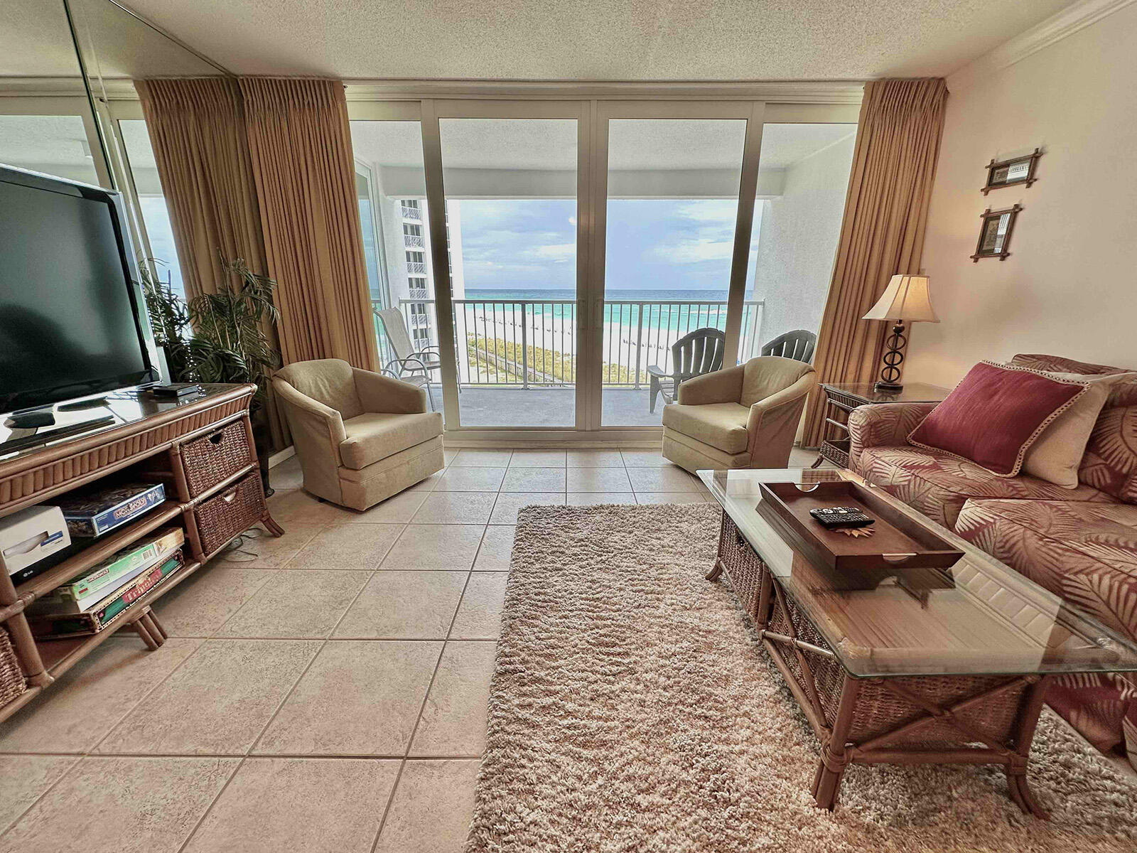 Welcome to Shoreline Towers Unit 2054, a stunning beachfront condo located on the fifth floor of Tower Two in the heart of Destin! This spacious 2-bedroom, 2-bathroom unit is designed for comfort and relaxation, making it the perfect beach getaway.Step into the master bedroom, where you'll find a luxurious king-size bed and a 32'' flat-screen TV for your entertainment. The guest bedroom offers two cozy double beds, also equipped with a flat-screen TV, making it ideal for families or friends. In the living room, you'll enjoy lounging with a large flat-screen TV, perfect for movie nights after a day at the beach.The kitchen features an open floor plan with tile countertops and a convenient breakfast bar, providing a perfect spot for casual dining. You'll appreciate the stackable washer and dryer located in the kitchen pantry for added convenience. The master bath boasts a walk-in shower with a safety bar, and the entire unit is tiled throughout, including the private balcony with breathtaking Gulf views. The mirrored wall in the living room adds a spacious and airy feel.

Shoreline Towers offers a wealth of amenities that will enhance your stay. Take a dip in the seasonally heated pool, relax in the sauna, play tennis or shuffleboard, and work out in the fitness room. The property also features picnic areas, grilling stations, and a lakeside clubhouse for gatherings with family and friends. For peace of mind, Shoreline Towers offers 24/7 security.

Located just minutes from all the action, Shoreline Towers places you within walking distance of fantastic restaurants, shops, and family-friendly activities. Big Kahuna's Water and Adventure Park is less than a mile away, offering endless fun for the kids. You'll love the convenience of having private beach access just steps from your door, with no streets to cross.

Explore the nearby Destin Commons, a vibrant, pedestrian-friendly outdoor mall with over 75 shops, restaurants, and entertainment options. Kids will enjoy the interactive water fountains and the pirate-themed playground, while the whole family can catch a movie at AMC or visit the Bass Pro Shop.

Unit 2054 at Shoreline Towers is the perfect place for a beachside retreat, offering comfort, convenience, and a prime location to experience all that Destin has to offer. Call today for property details and availability!