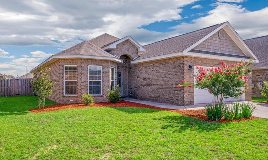 Community POOL! The Isabella floorplan 1948 sq ft. This Freshly Painted Split Plan is a 4 bed/2 bath home filled with upgrades and custom touches. Luxury Vinyl Plank Flooring in Entryway/Hallways/Dining Area & Kitchen. The Open Kitchen has an Island/Breakfast Bar/Stainless Steel Appliances/Granite Countertops & New Subway Tile Backsplash. The Living Room is Defined by a Carpet Inlay and Trey Ceiling.  The Private Master Suite has Carpet and Trey Ceiling. Master Bath Offers a Separate Tiled Shower/Granite Double Vanity/Garden Tub with New Tiled Surround & Large Walk-in Closet. The 3rd and 4th bedrooms are separated by another Full Bathroom with Shower/Tub Combination and Granite Countertop.  Covered Back Porch/Privacy Fenced Backyard and a 2 Car Garage. Redstone Commons is a Great Community with a Playground / Dog Park / Large Private Pool/Covered Pavilion with Outdoor Kitchen/Granite Counters and Lounge space. All this just minutes from Shopping, Hospital & Interstate 10.  *( Rooms have been upgraded to gray paint since pictures were taken )