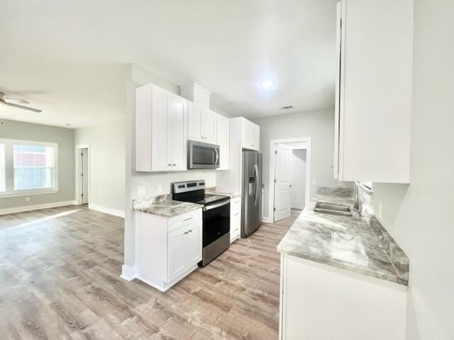 VILLATASSO TOWN OF - Residential Lease